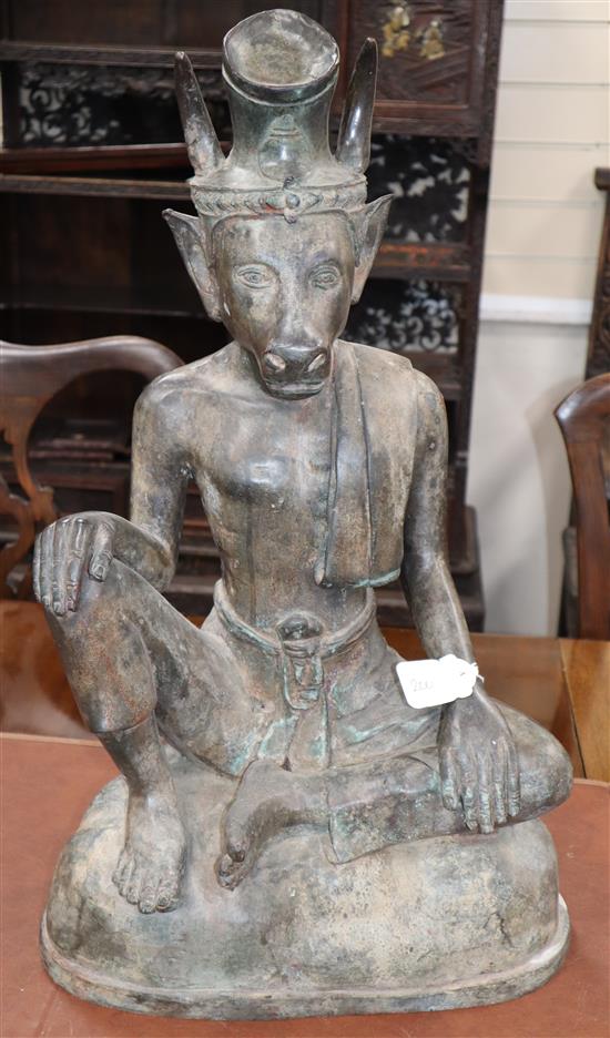 An Indian Hindu bronze seated figure of Adhikara Nandi, height 65cm